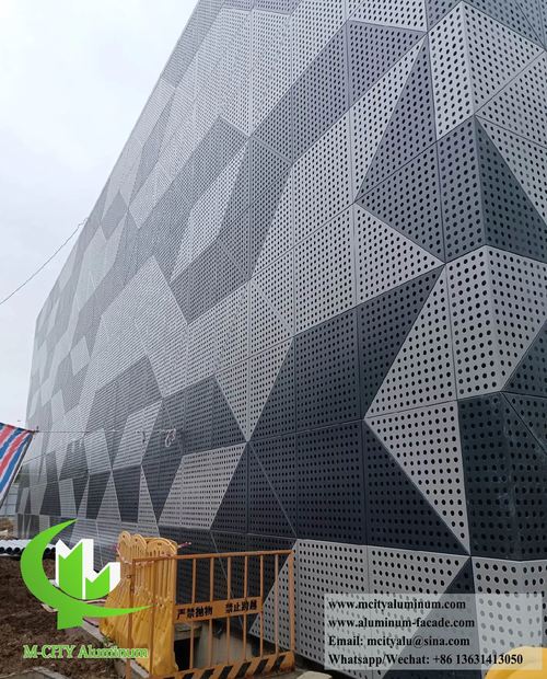 에 대한 최신 회사 뉴스 고체 알루미늄 클래핑: 놀라운 새로운 프로젝트로 건축 미학을 재정의